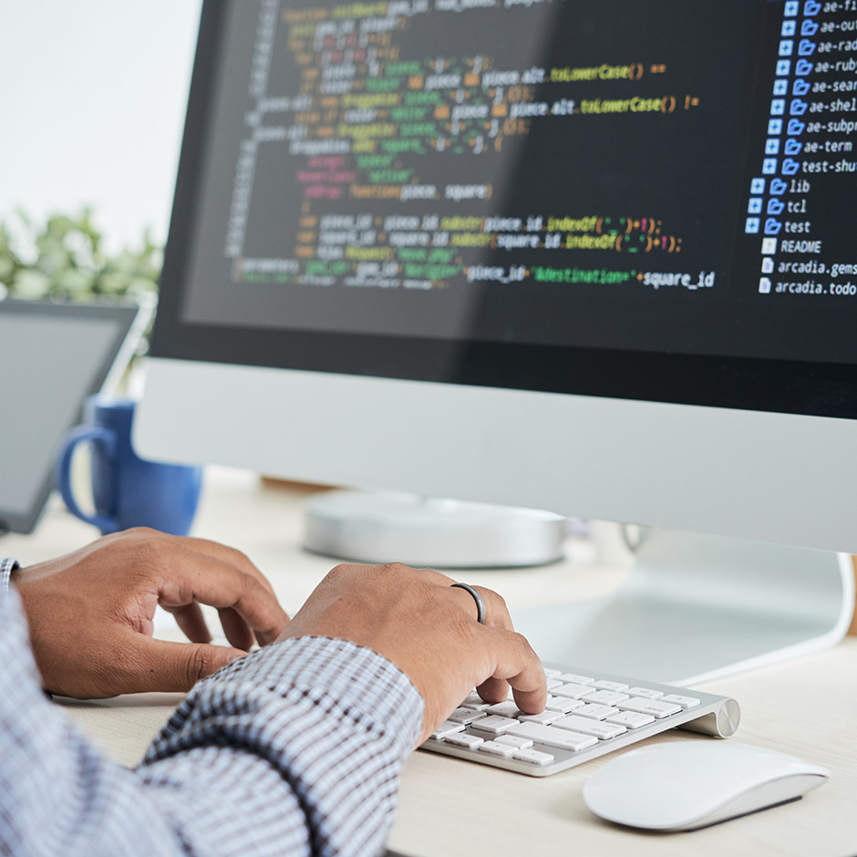 INC cyber security analyst reviewing source code